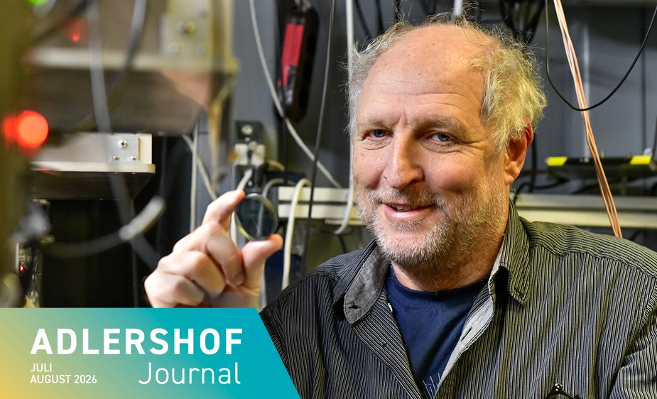 A researcher with a sample in a sample holder