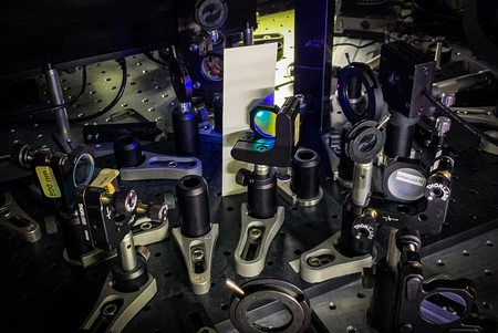 Table with various optical components mounted on it